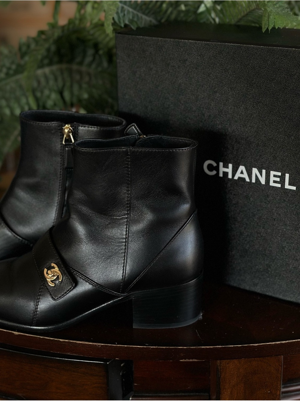 Authentic Chanel black leather CC turnlock ankle boots